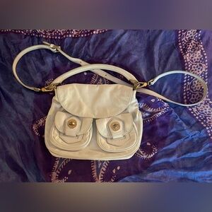 Marc Jacobs cream lambskin leather bag. Excellent used condition no noted flaws.